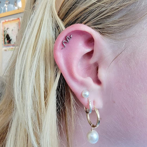 Explore narrow tattoo ideas, creative tattoo ideas in Traverse City, available at Pinups & Needles