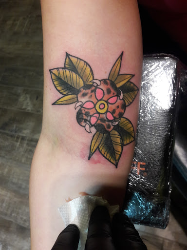 Find tattoo ideas mom for your next unique tattoo in Lakeland at Black Swan Tattoo