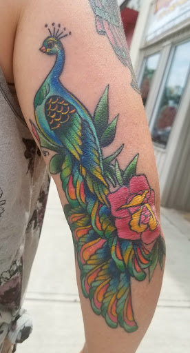 Explore lupus tattoo ideas, creative tattoo ideas in Powell, available at Hummingbird Tattoo Studio