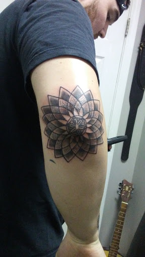 Explore tattoo face ideas, creative tattoo ideas in Russellville, available at BG Tattoos