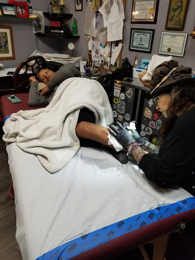Explore orchid tattoo ideas, creative tattoo ideas in Saint Augustine, available at Ms. Deborahs Fountain of Youth Tattoo & Body Piercing