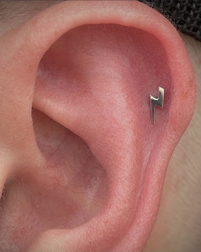 Explore street signs tattoo ideas, creative tattoo ideas in Oklahoma City, available at Oklahoma Tattoo Collective