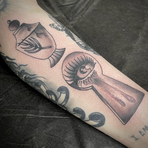 Explore the beatles tattoo ideas, creative tattoo ideas in Buffalo, available at True Gloom Tattoo Studio