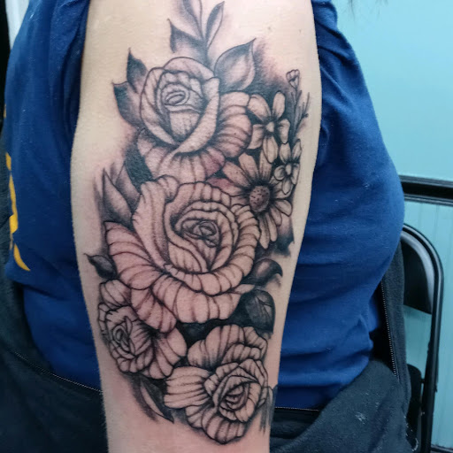 Find angel tattoo ideas for men for your next unique tattoo in Kannapolis at Ink Station Tattoo Studio