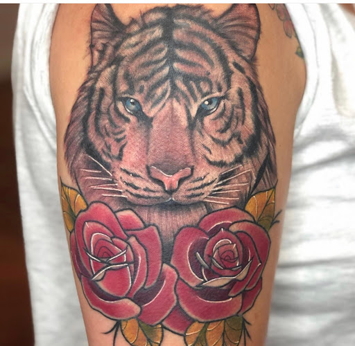 Explore year of the dragon tattoo ideas, creative tattoo ideas in Aledo, available at Elevated Tattoo & Piercing