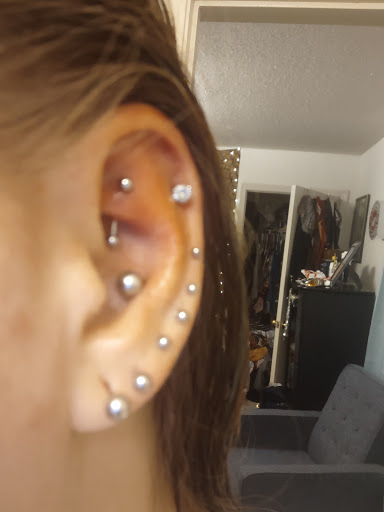 Explore last name back tattoo ideas, creative tattoo ideas in Jasper, available at The Mad Tatter