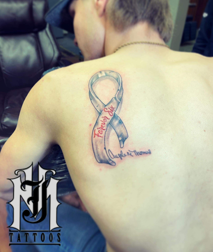 Explore curly hair tattoo ideas, creative tattoo ideas in Williamsport, available at Moa Tattoos