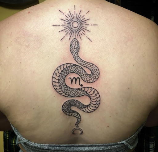 Explore scoliosis tattoo ideas, creative tattoo ideas in Chattanooga, available at Standard Ink Tattoo Co