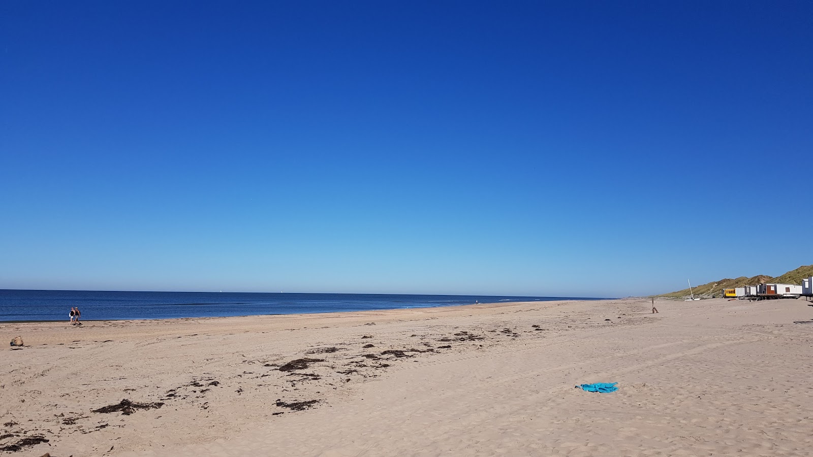 Bakkum beach的照片 带有碧绿色水表面