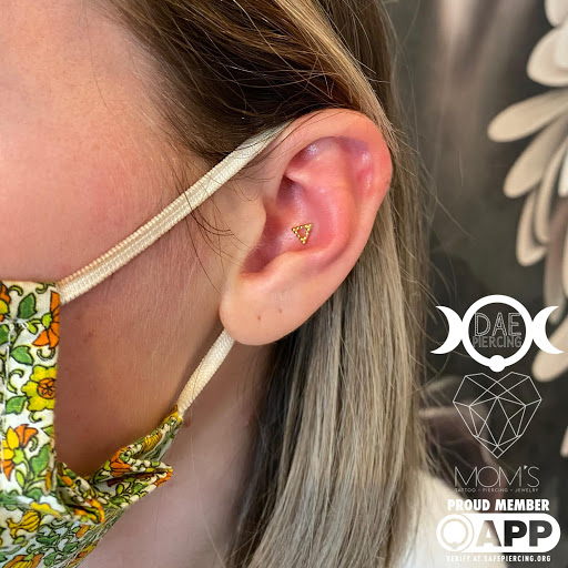 Explore fighting tattoo ideas, creative tattoo ideas in Spokane, available at Moms Custom Tattoo & Body Piercing