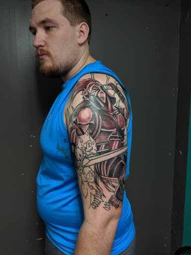 Tattoo Shop «Defiance Tattoos», reviews and photos, 163 E Main St, Kent, OH 44240, USA