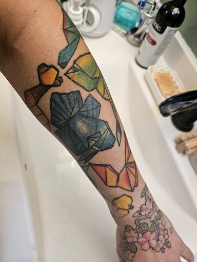 Explore asl tattoo ideas, creative tattoo ideas in Towson, available at Layer 3 Collective