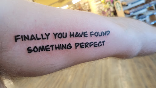 Explore western tattoo ideas for men, creative tattoo ideas in Peoria, available at Top Rocker Tattoo