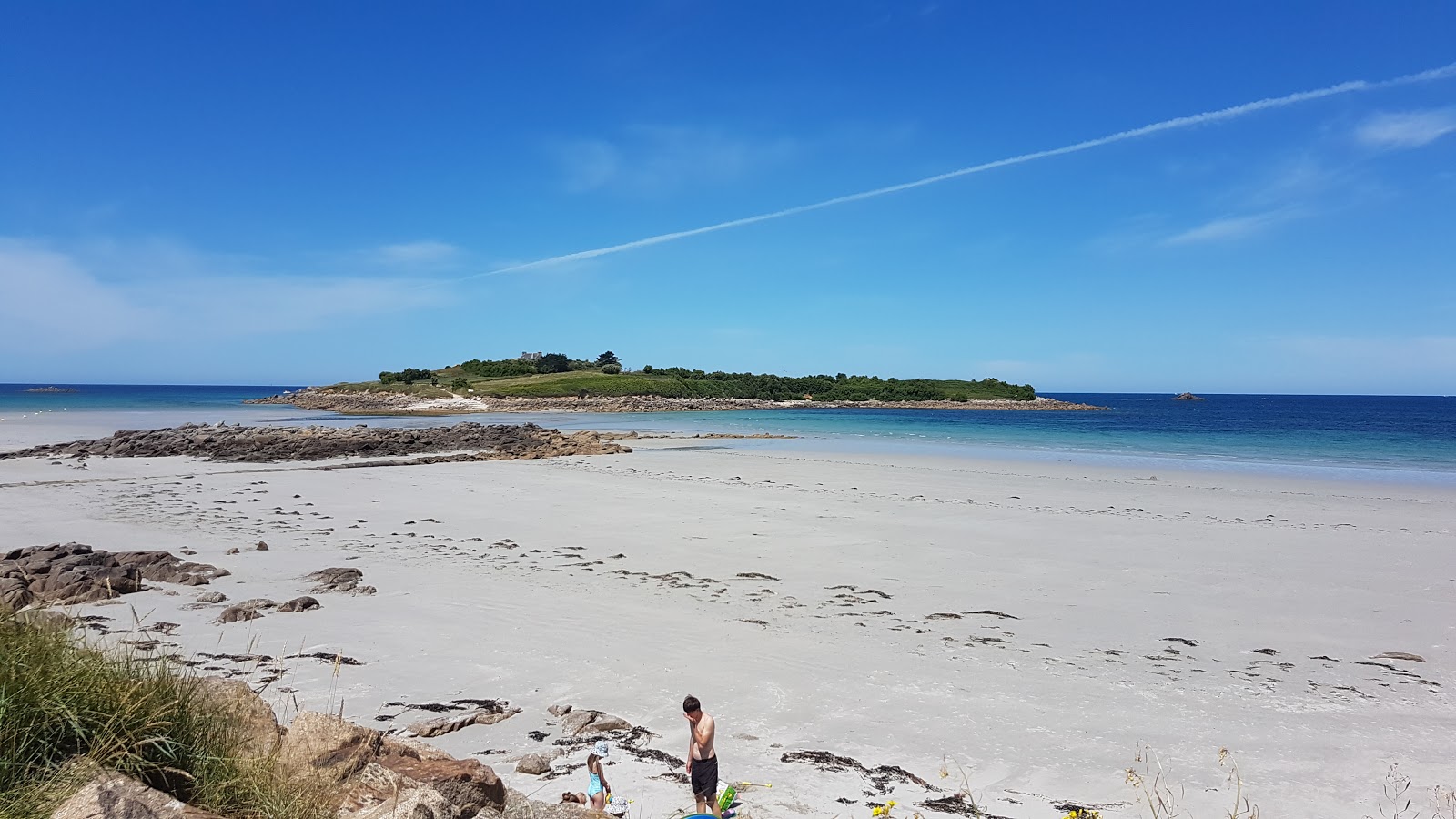Foto di Plage de Dossen con una superficie del sabbia bianca