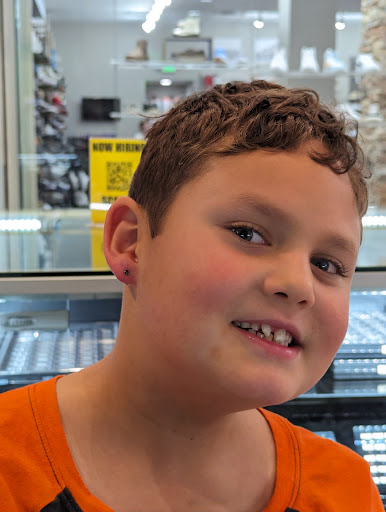 Explore afro tattoo ideas, creative tattoo ideas in Albuquerque, available at Rapture Body Piercing & Jewelry Coronado Mall