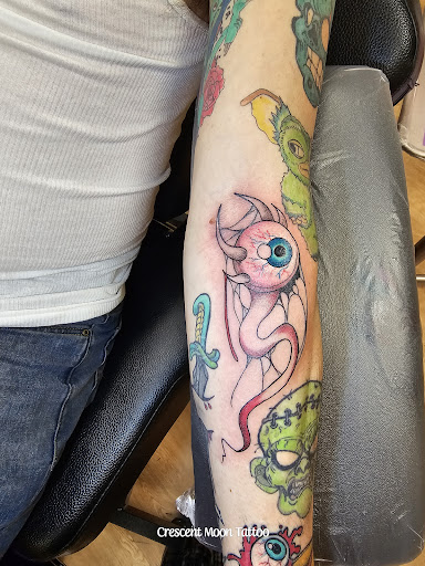 Explore paintbrush tattoo ideas, creative tattoo ideas in New Hampton, available at Crescent Moon Tattoo