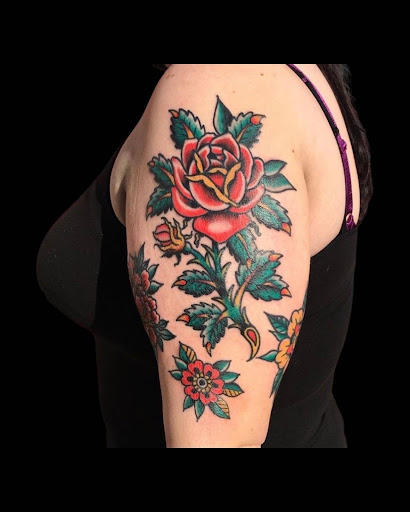 Explore black hole tattoo ideas, creative tattoo ideas in Charlotte, available at Canvas Tattoo & Art Gallery