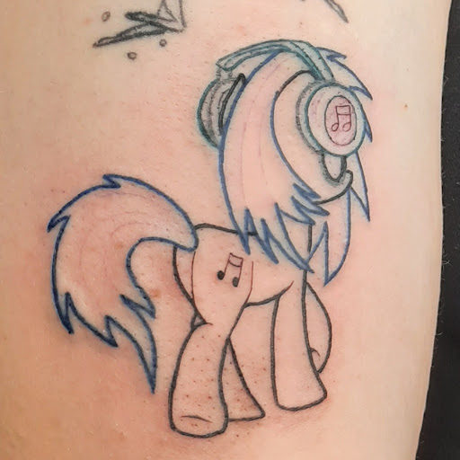 Explore sunflower tattoo idea, creative tattoo ideas in La Porte, available at Artistic Outcasts Tattooing