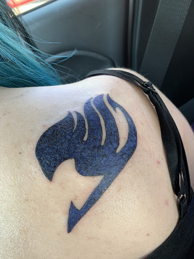 Explore cover up tattoo ideas for women, creative tattoo ideas in Bellevue, available at The Electric Ink Society