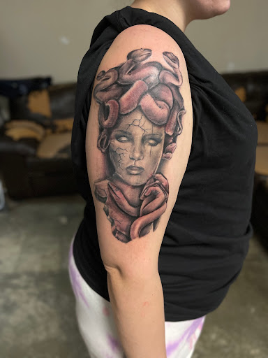 Explore tattoo cover up ideas for upper back, creative tattoo ideas in Conroe, available at Monsters Ink, LLC