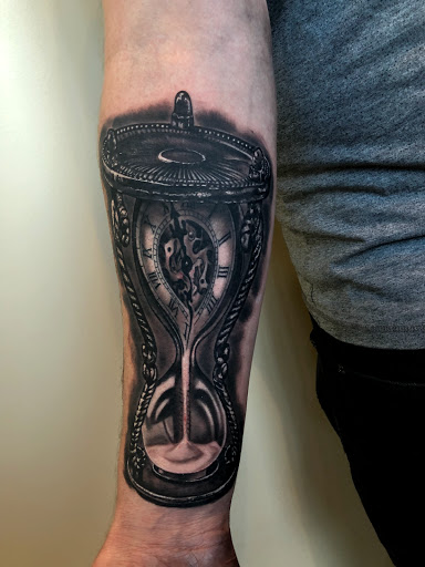 Explore little bird tattoo ideas, creative tattoo ideas in Lakeville, available at SharkTooth Tattoo & Gallery