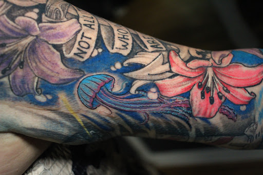 Explore tramp stamp lower back tattoo cover up ideas, creative tattoo ideas in Homosassa, available at Citrus Tattoos