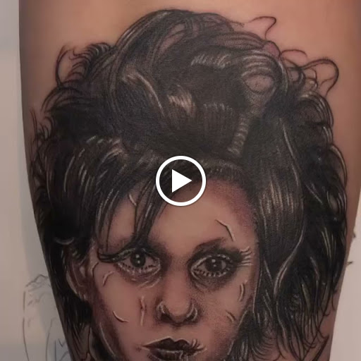 Explore hand tattoo ideas for men, creative tattoo ideas in Buffalo, available at True Gloom Tattoo Studio