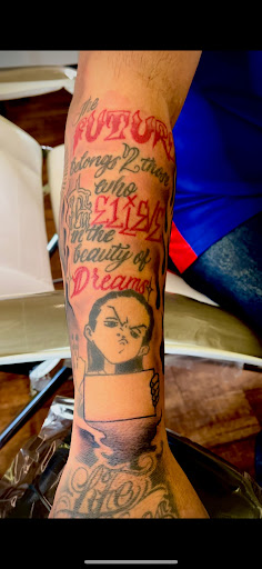 Explore tattoo ideas for dark skin men, creative tattoo ideas in Rogers, available at Ink Solutions Tattoo