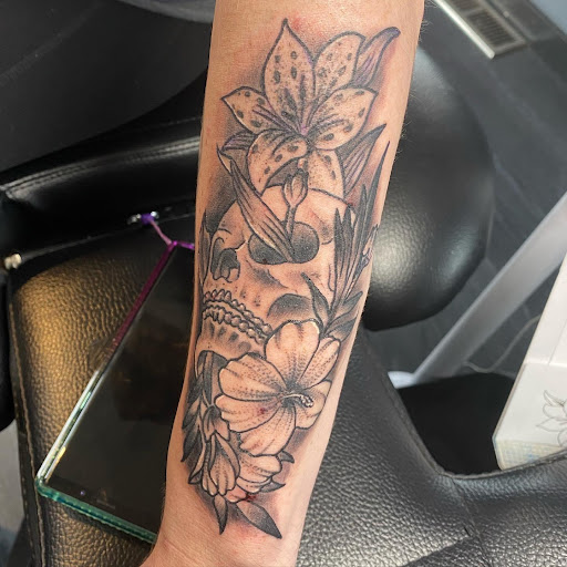 Explore mens wrist tattoo ideas, creative tattoo ideas in Niles, available at 3 Shades of Black Tattoo Studio