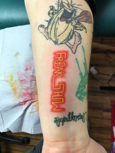 Explore lost time tattoo ideas, creative tattoo ideas in Green Bay, available at Skinny Buddha Tattoo