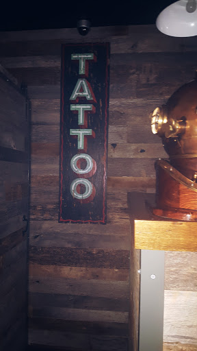 Explore monopoly man tattoo ideas, creative tattoo ideas in Manassas, available at Exposed Temptations Tattoo