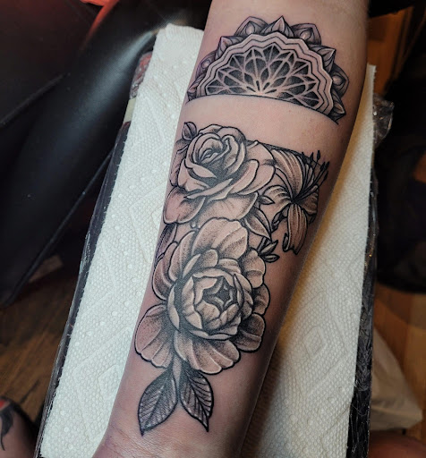 Explore black female tattoos ideas, creative tattoo ideas in Baltimore, available at Studio 7 Tattoo and Art Gallery