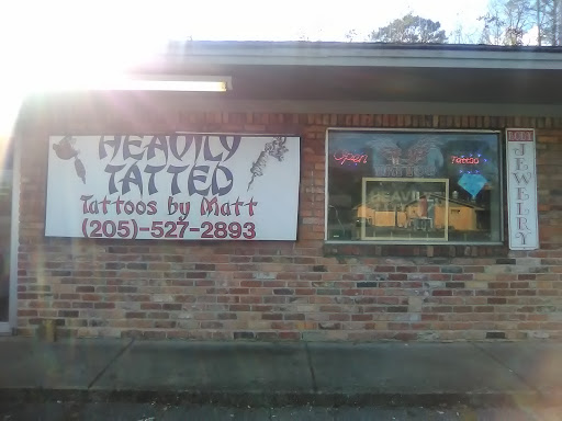 Explore tattoo ideas for men hand, creative tattoo ideas in Birmingham, available at Heavily Tatted