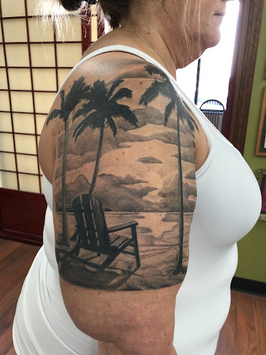 Explore grapevine tattoo ideas, creative tattoo ideas in Sioux City, available at 712 Tattoo