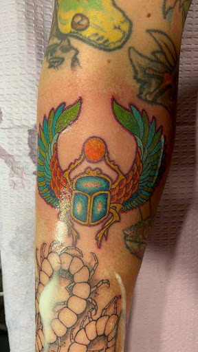 Explore pink floyd tattoo ideas, creative tattoo ideas in East Providence, available at Shrine Tattoo Studio
