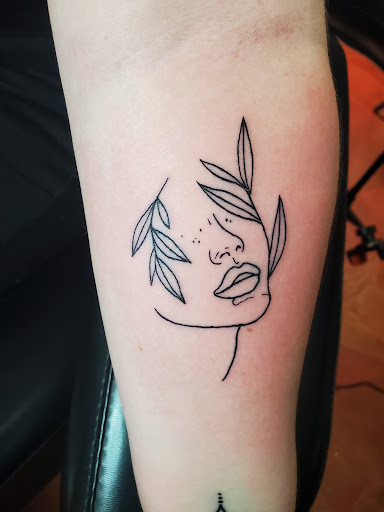 Explore feminine sleeve tattoo ideas, creative tattoo ideas in Inverness, available at The Perfect Spot Tattoos