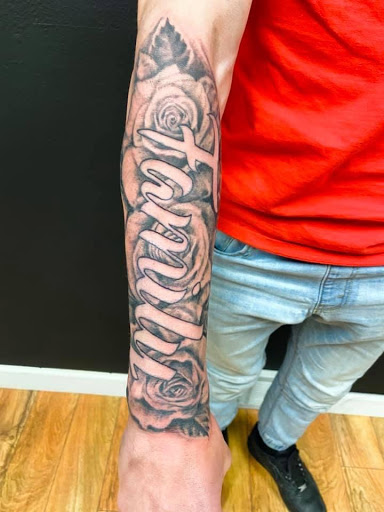 Explore irish cross tattoo ideas, creative tattoo ideas in Sioux Falls, available at Starry Eyed Studio