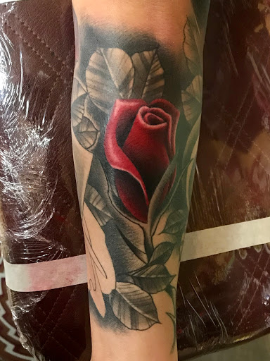 Explore back of neck tattoo cover up ideas, creative tattoo ideas in Lakewood, available at Aces and Eights Tattoo