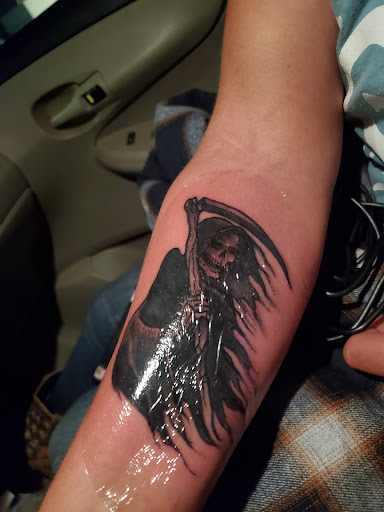 Explore cute female tattoos ideas, creative tattoo ideas in Warrior, available at The Great Wilderness Tattoo
