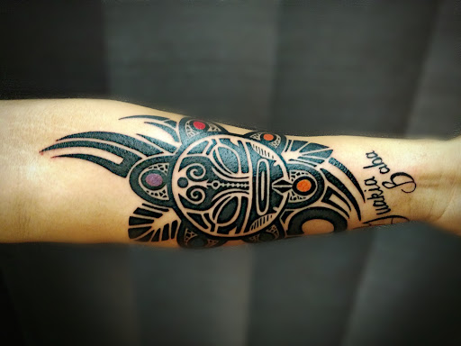 Explore full neck tattoo ideas, creative tattoo ideas in Groves, available at Billet Tattoo Studio