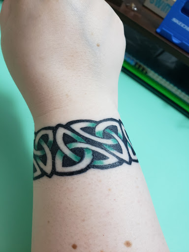 Explore chain tattoo ideas, creative tattoo ideas in Little Falls, available at BLACKWORK TATTOO SHOP NJ