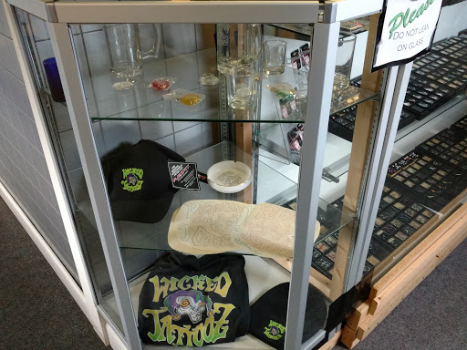 Find watch tattoo ideas for your next unique tattoo in Minerva at Wicked Tattooz