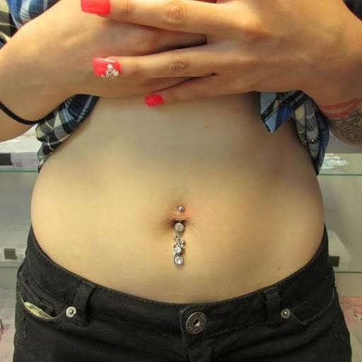 Explore lovers tattoo ideas, creative tattoo ideas in Elko, available at Tom Custom Tattoos and Body Piercing Studio