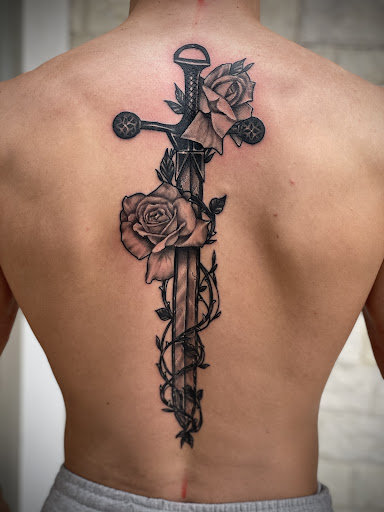 Explore cool hand tattoo ideas for guys, creative tattoo ideas in Lakeview, available at Backwoods Tattoo Studio