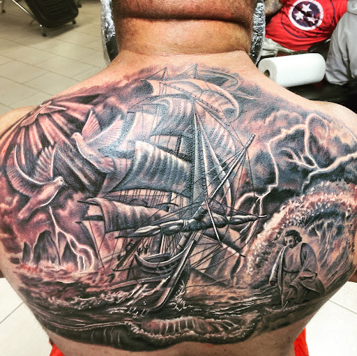 Explore tattoo ideas spine, creative tattoo ideas in Sarasota, available at SEVEN SINS Tattoo Studio