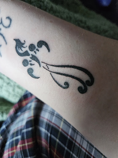 Explore matching tattoo ideas for mom and daughter, creative tattoo ideas in Omaha, available at Ironwood Ink