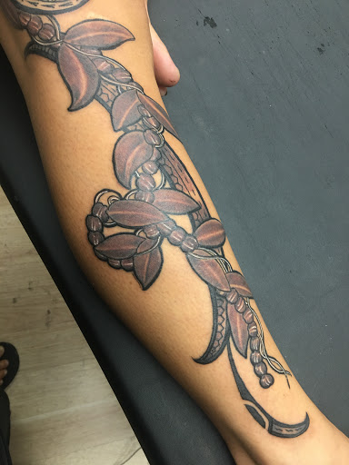 Explore full neck tattoo ideas, creative tattoo ideas in Hilo, available at Native Flesh Tattoo