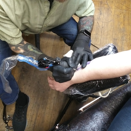 Explore brain tattoo ideas, creative tattoo ideas in Des Moines, available at Lucky Gal Tattoo & Piercing