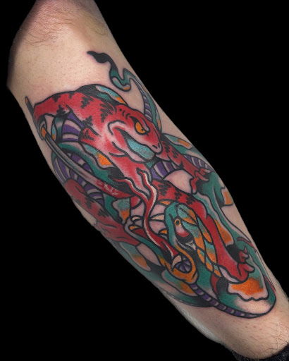 Explore italian horn tattoo ideas, creative tattoo ideas in Johnson City, available at Gold Cross Tattoo Co.