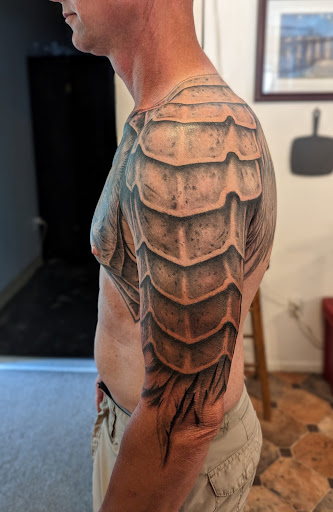 Explore manifestation tattoo ideas, creative tattoo ideas in Hebron, available at Explosive Ink Tattoo